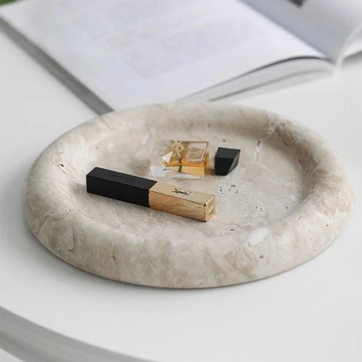 Elegant travertine serving tray with a smooth, round design and neutral beige colour for versatile home decor use