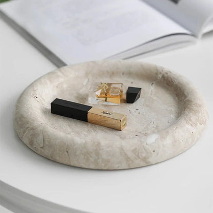 Elegant travertine serving tray with a smooth, round design and neutral beige colour for versatile home decor use