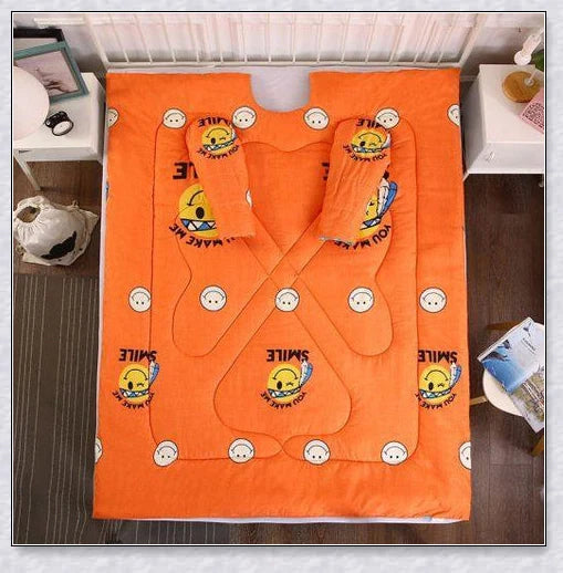 A cosy, wearable quilt with sleeves in a variety of colourful designs, perfect for staying warm and comfortable during the winter months.
