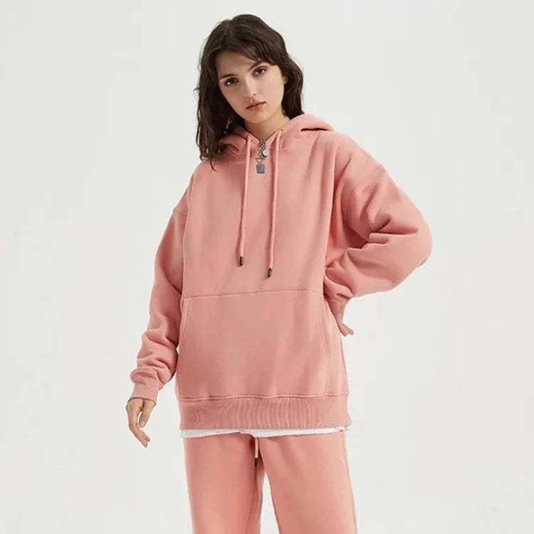 Cosy fleece hoodie and jogger set in light pink, grey, and navy blue colours for ultimate comfort and style