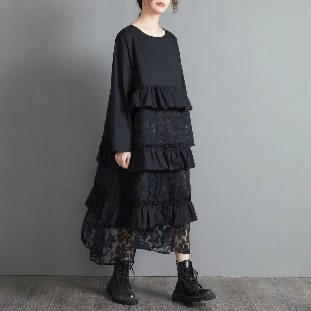 Plus size black lace dress with long sleeves and a loose, relaxed fit for a timeless and sophisticated look