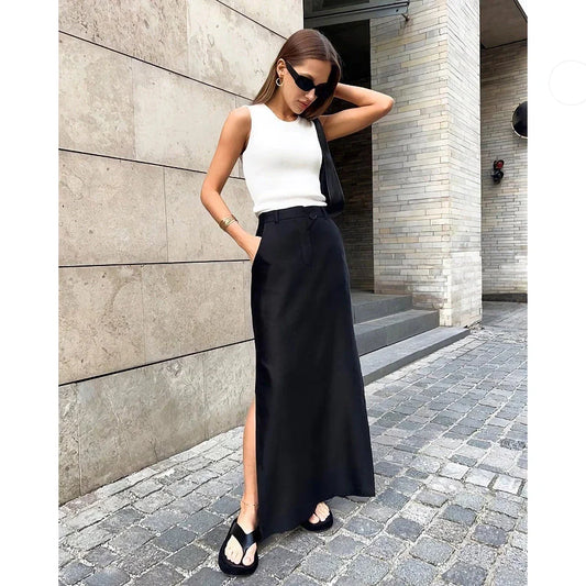 Elegant black ankle-length A-line skirt with pockets, made of high-quality polyester, spandex, and viscose blend fabric