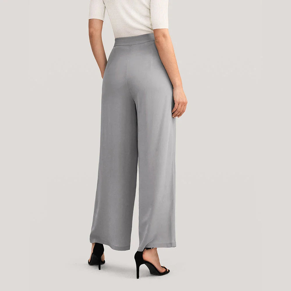 Exquisite grey silk wide-leg trousers with high-waisted design and relaxed fit for sophisticated style