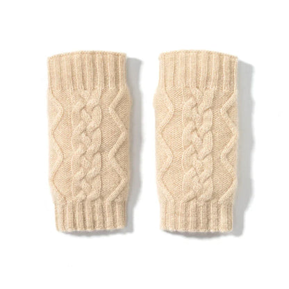 Luxurious cashmere gloves in beige and camel colours, showcasing a unique twist design for a stylish, streamlined silhouette