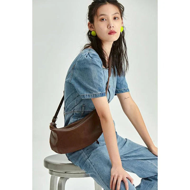 Stylish leather crossbody fanny pack with vintage half-moon design, perfect for everyday use in the UK
