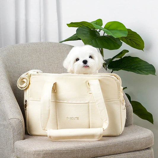 Portable One-Shoulder Pet Carrier Bag made of soft, breathable cotton for comfortable pet travel in the UK