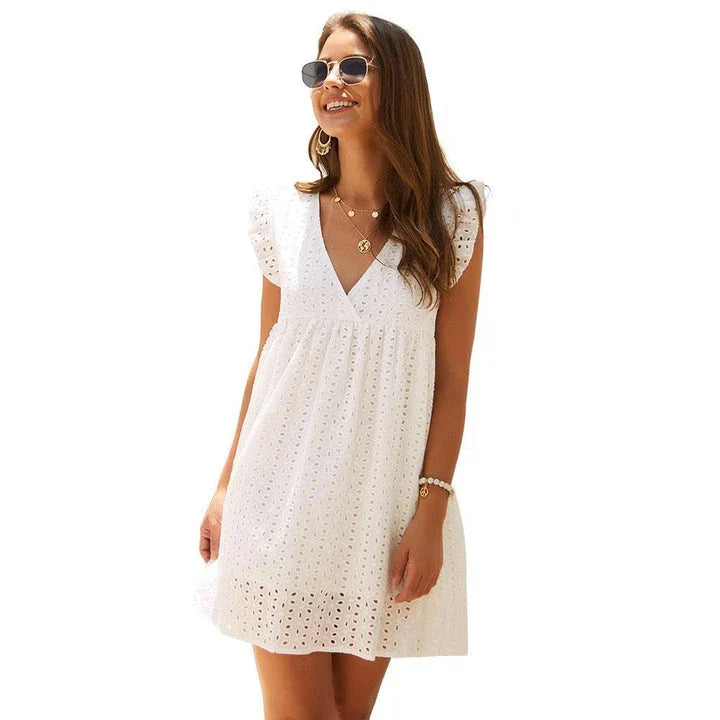 Elegant white lace dress with a flattering silhouette, perfect for British casual occasions
