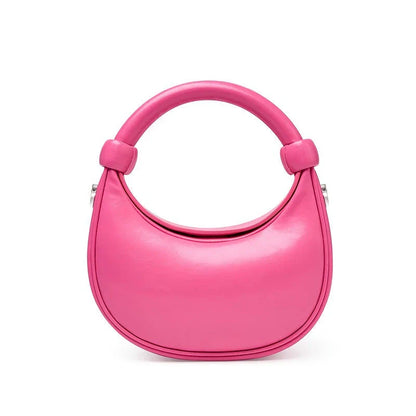 Elegant rose pink leather crescent-shaped crossbody bag with adjustable strap and zipper closure
