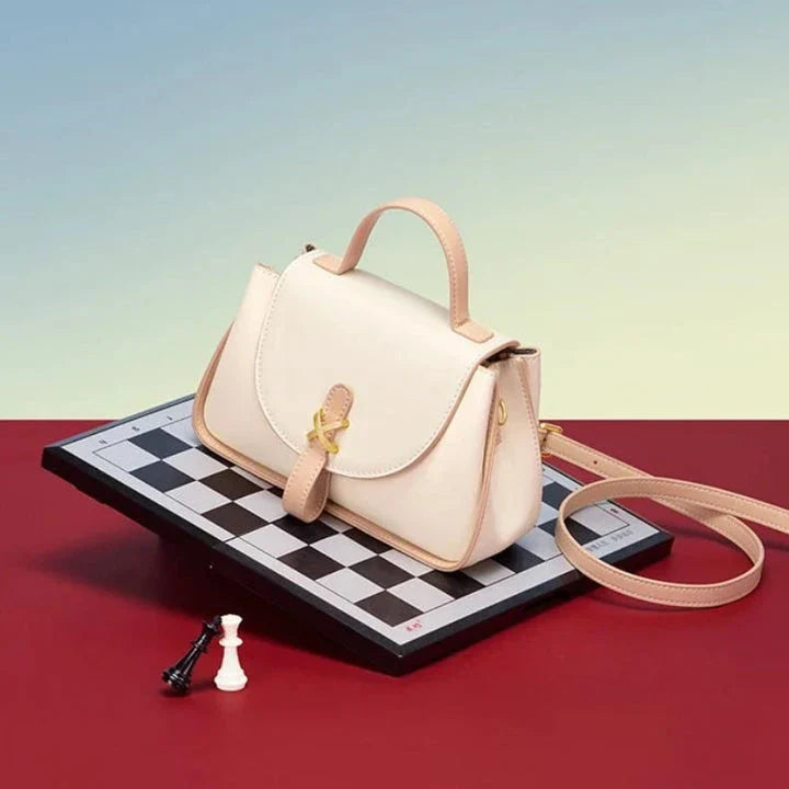 Luxury leather shoulder bag for women, featuring a sleek design, spacious interior, and premium split leather construction.