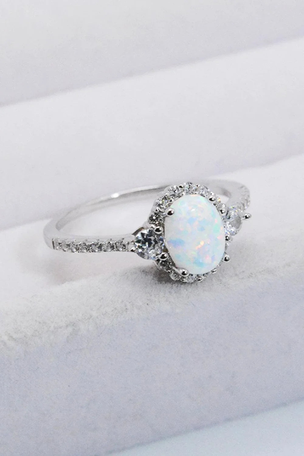 A stunning platinum-plated opal ring made from 925 sterling silver, featuring a modern and minimalist design