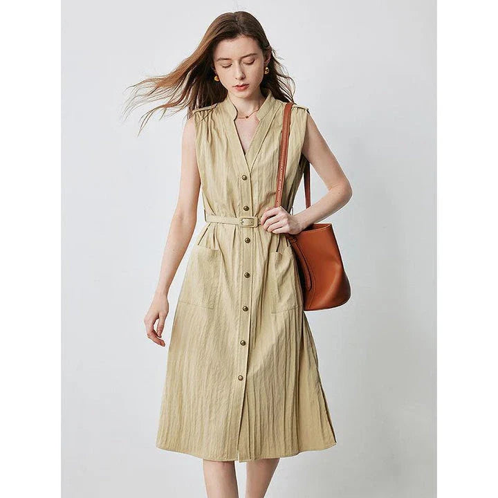 Elegant sleeveless midi shirt dress with V-neck and side pockets, perfect for summer in the UK