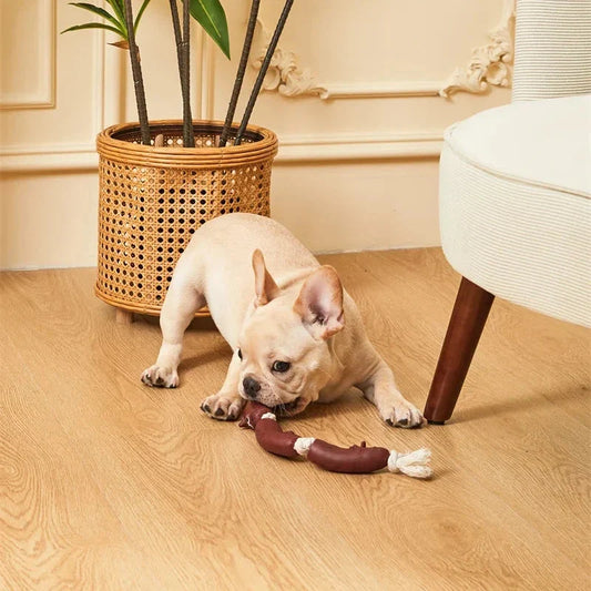 A durable cotton rope and vinyl sausage chew toy for pets, designed to provide interactive play and promote dental health.