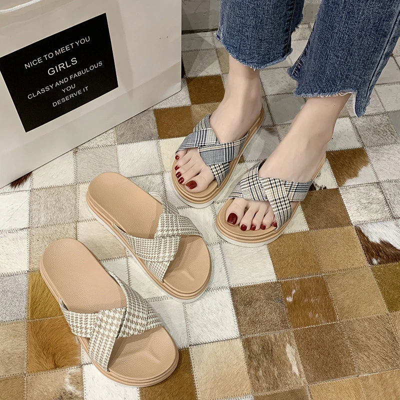 Premium non-slip herringbone slippers with a bow accent, featuring a canvas upper, fetal cowhide lining, and a rubber sole for comfort and stability.
