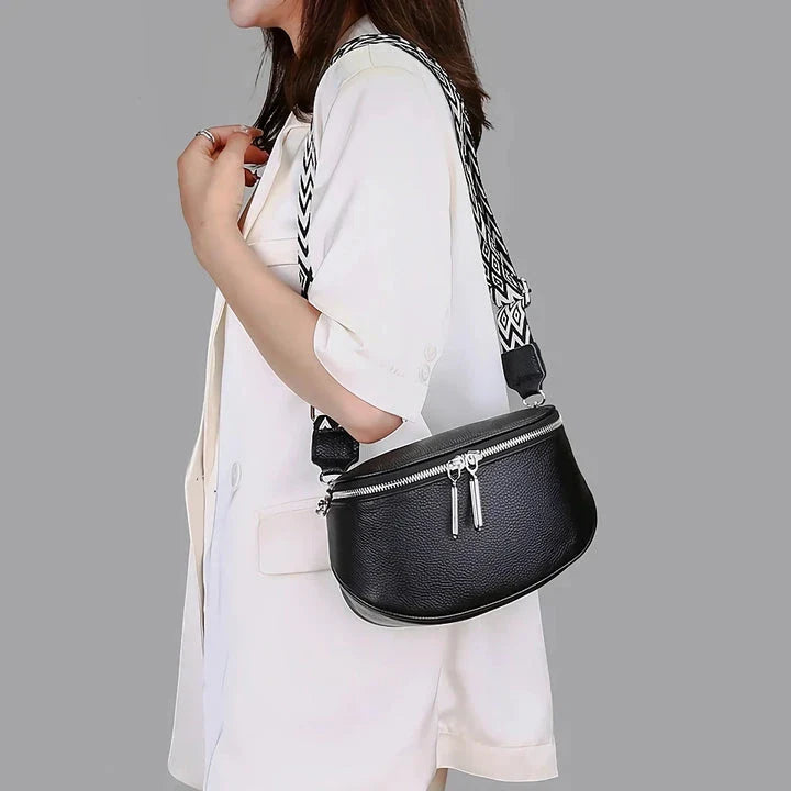 Premium genuine leather tote bag with adjustable strap and interior compartments for fashion-forward women