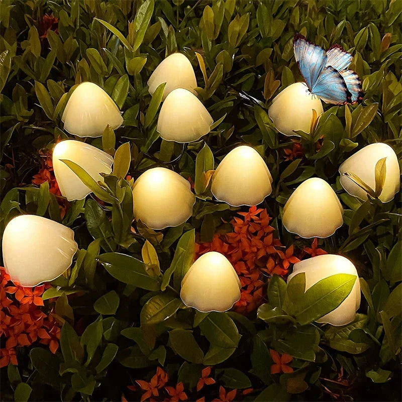 Solar-powered mushroom-shaped pathway lights creating a magical ambiance in a garden or backyard