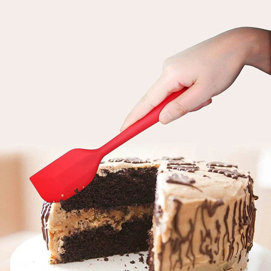 Versatile non-stick silicone cooking spatula in various colours, perfect for flipping, stirring, and serving a wide range of dishes
