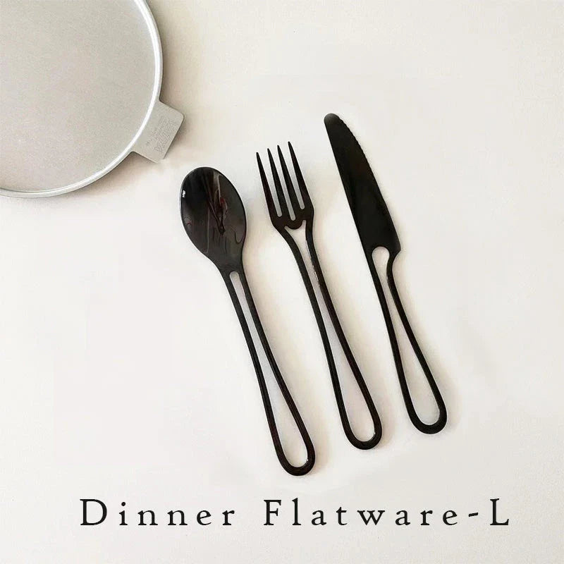 Sophisticated 304 stainless steel cutlery set with sleek black finish for elegant dining in the UK
