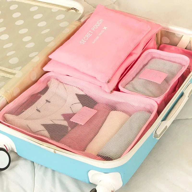 Premium 6-Piece Travel Organiser Bag Set in Pink, featuring durable polyester construction and a variety of sizes for organised packing