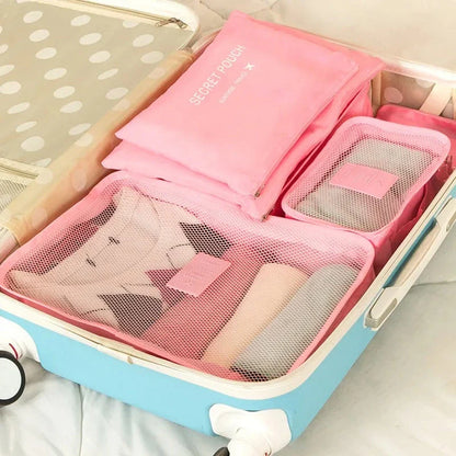 Premium 6-Piece Travel Organiser Bag Set in Pink, featuring durable polyester construction and a variety of sizes for organised packing