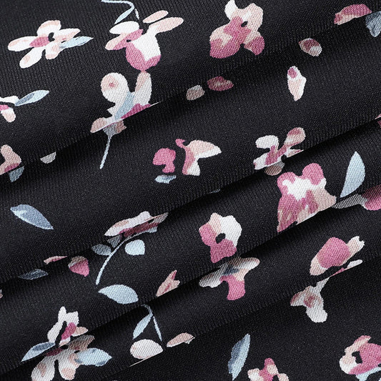 Stylish spaghetti strap floral sundress in black with a flattering v-neck and bodycon silhouette