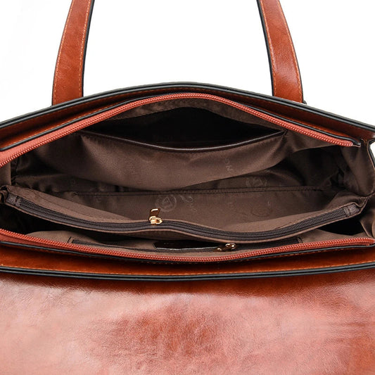 Premium crocodile pattern leather shoulder bag in multiple colours, featuring a pillow-shaped design for comfortable carrying and multiple interior pockets for organisation.