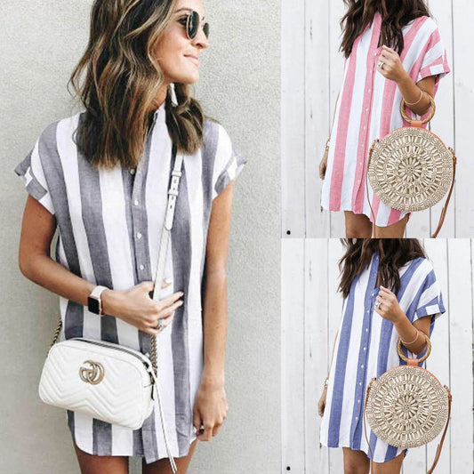 Casual striped short sleeve shirt dress in pink and blue colours, featuring a relaxed, flowing silhouette and button-down closure