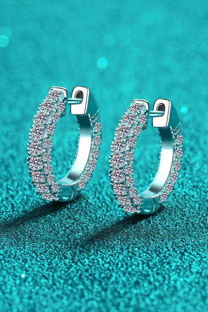 Elegant 925 sterling silver moissanite huggie earrings with a minimalist design and polished finish