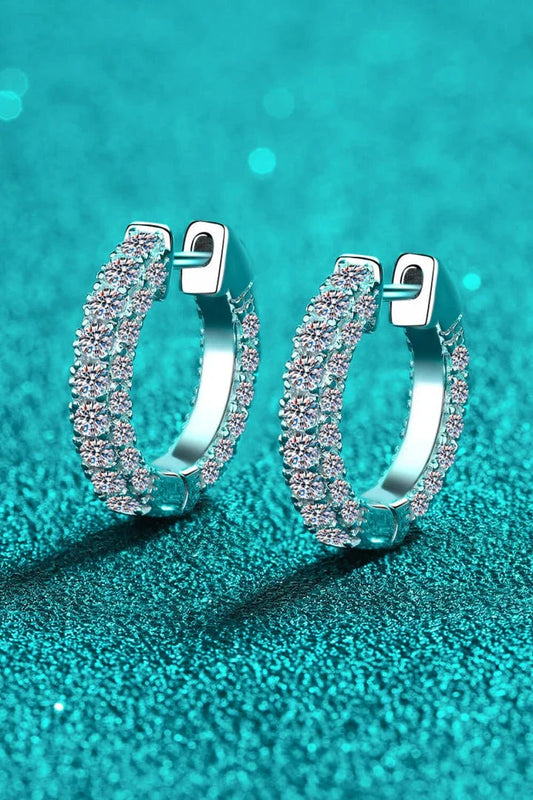 Elegant 925 sterling silver moissanite huggie earrings with a minimalist design and polished finish