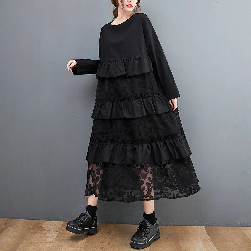 Stylish plus size dress in sophisticated black mesh fabric with wide waistline and long sleeves