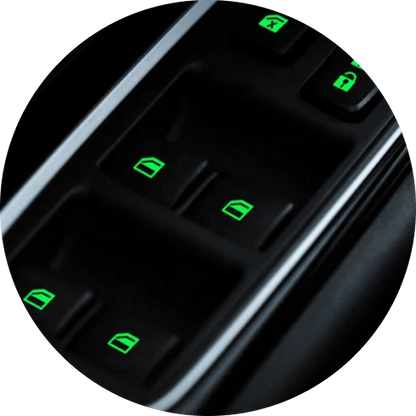 Fluorescent car button stickers emitting a bright green glow for easy visibility in the dark