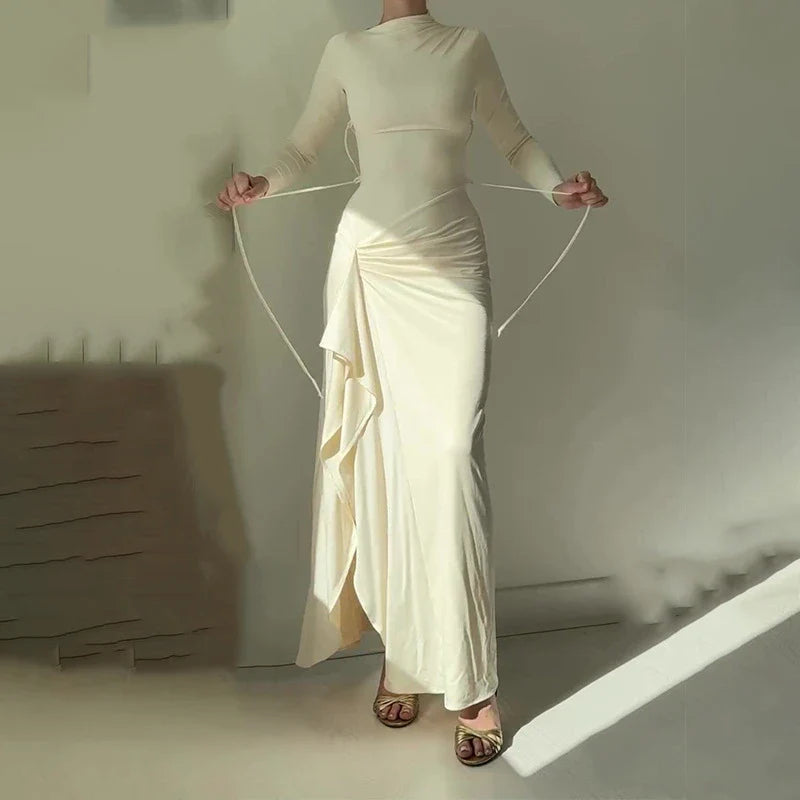 Trendha slim-fit autumn dress in champagne and wine red colours, featuring a flattering silhouette and subtle split detail