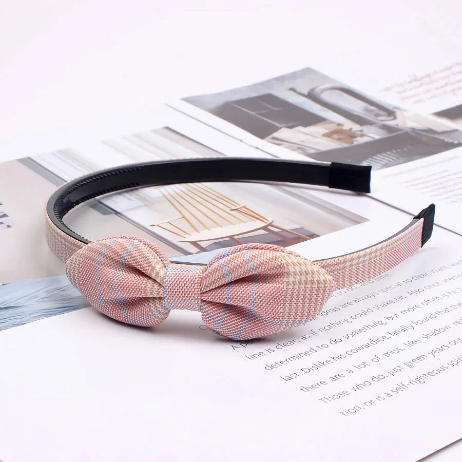 Charming bow headband for girls, a stylish hair accessory made from high-quality canvas and rubber for a comfortable, secure fit