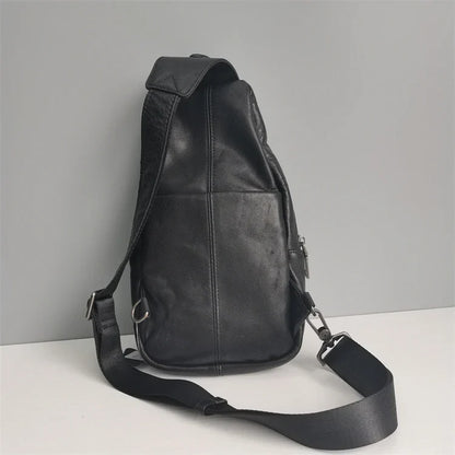 Premium black leather chest bag with zipper closure, adjustable strap, and ample storage space for everyday essentials