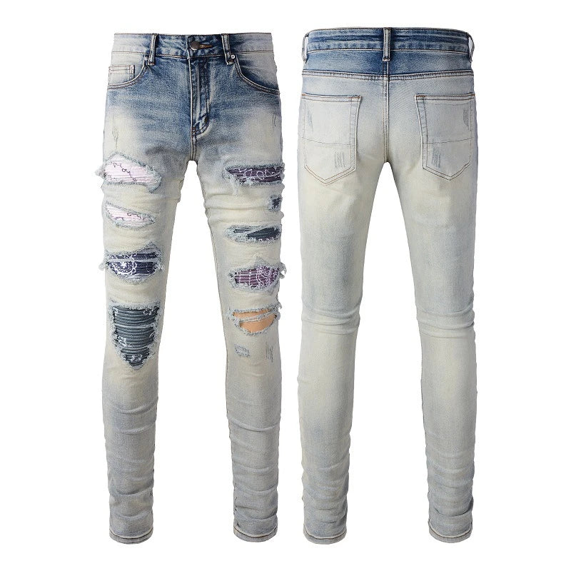 Stylish distressed denim jeans with a skinny, knee-exposed silhouette for a contemporary, high-street fashion look