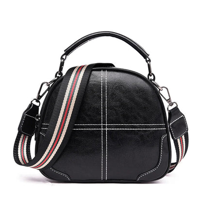 Premium PU leather shoulder bag with stitched design and multiple internal pockets for versatile, organised storage