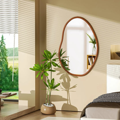 Stylish mid-century asymmetric decorative wall mirror with solid beech wood frame, adding visual interest and reflecting light to create a brighter, more open living space.