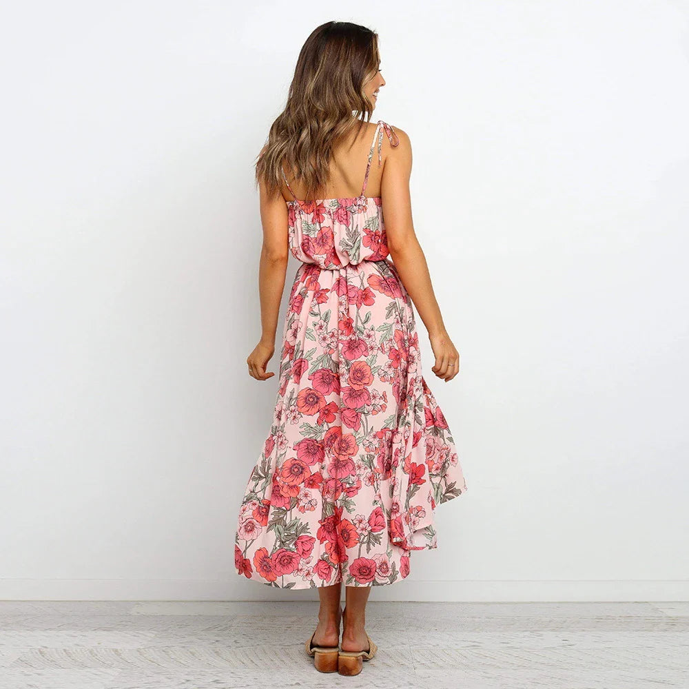 A premium printed camisole dress in a vibrant red colour, featuring a flattering mid-length skirt and high-waist design for a sophisticated, feminine look.