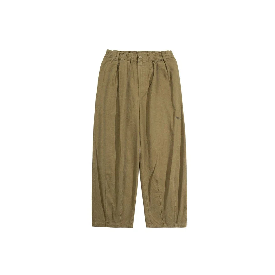 Sophisticated men's casual trousers in various colours, featuring a tailored straight-leg design and mid-rise waistline for a polished, British-inspired look.