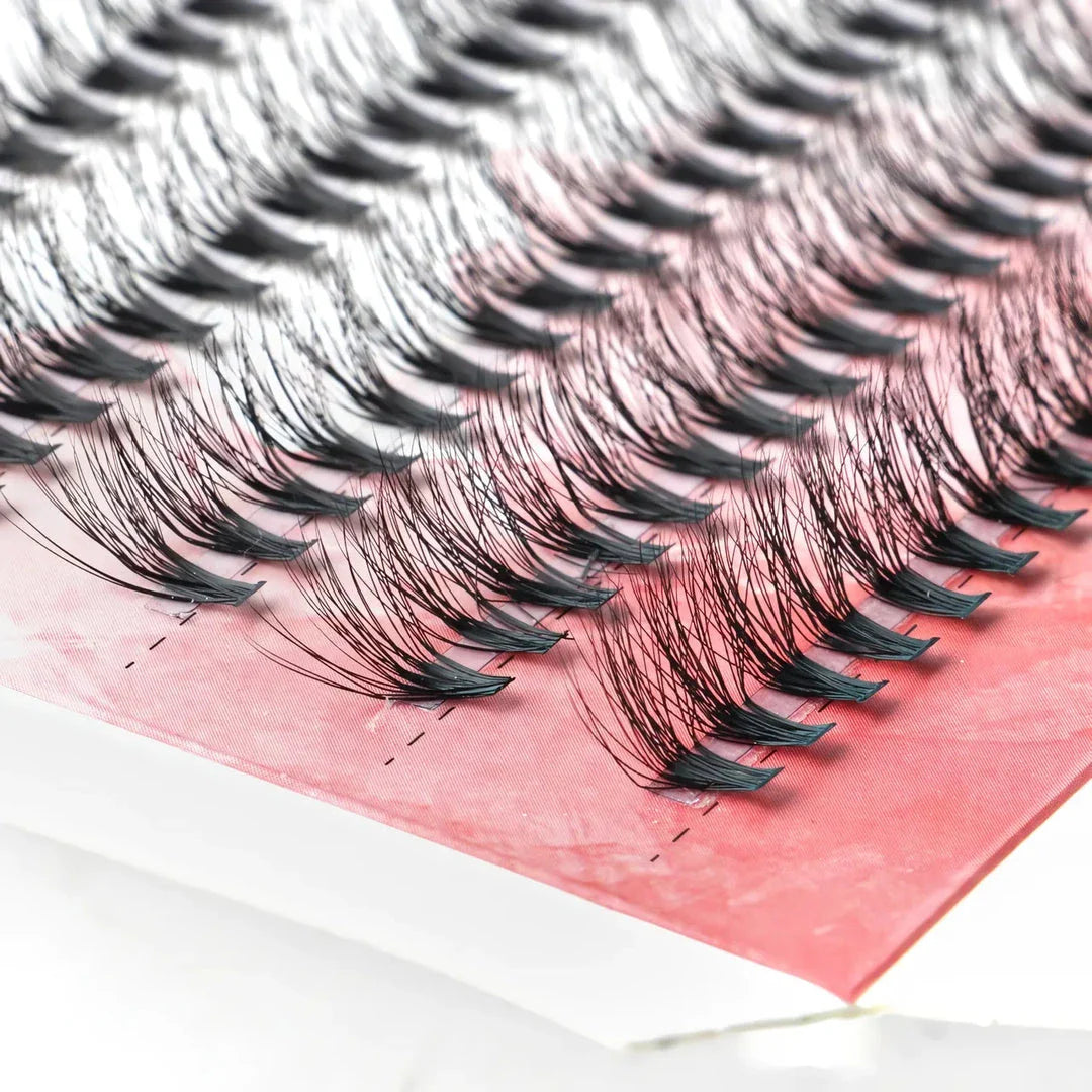 Premium mink eyelash extensions in various lengths and thicknesses for a captivating, natural-looking eye enhancement
