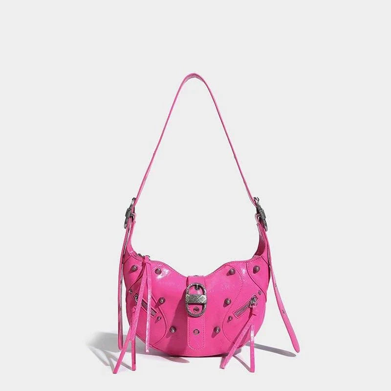 Stylish pink leather sling crossbody daypack with adjustable strap and smooth zipper closure