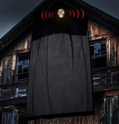 Voice-activated Halloween decoration with ghost-shaped design, lighting, and sound effects