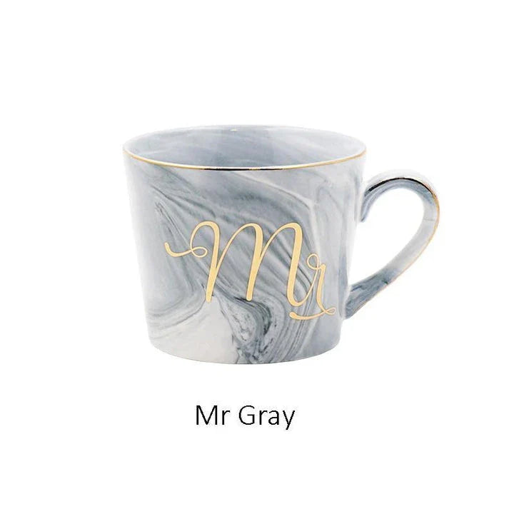 Elegant marble-inspired porcelain coffee mug with a sleek and sophisticated British design