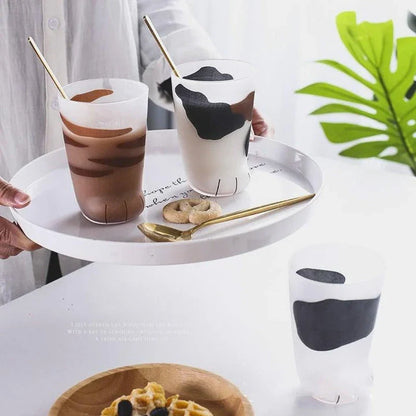 Charming cat paw shaped glass mug with a generous 301-400 ml capacity, perfect for enjoying your favourite hot beverage