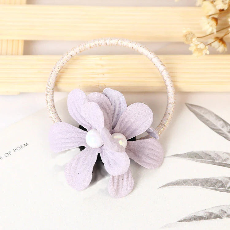 Stylish floral elastic hair rope with a secure hold and comfortable design, perfect for everyday wear
