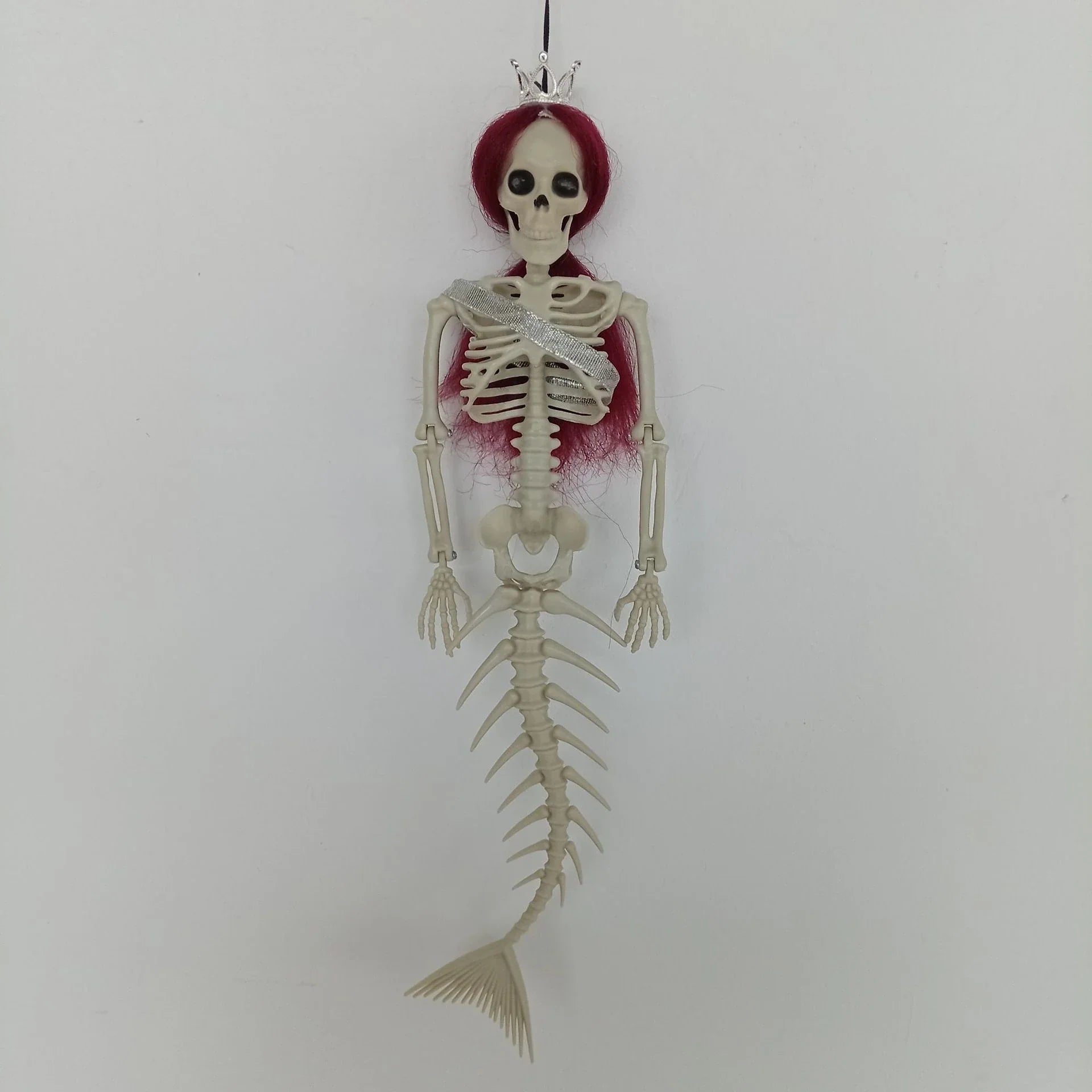 Mermaid bone pendant decoration in brown, dark purple, burgundy, and lake blue colours, ideal for Halloween outdoor courtyard displays