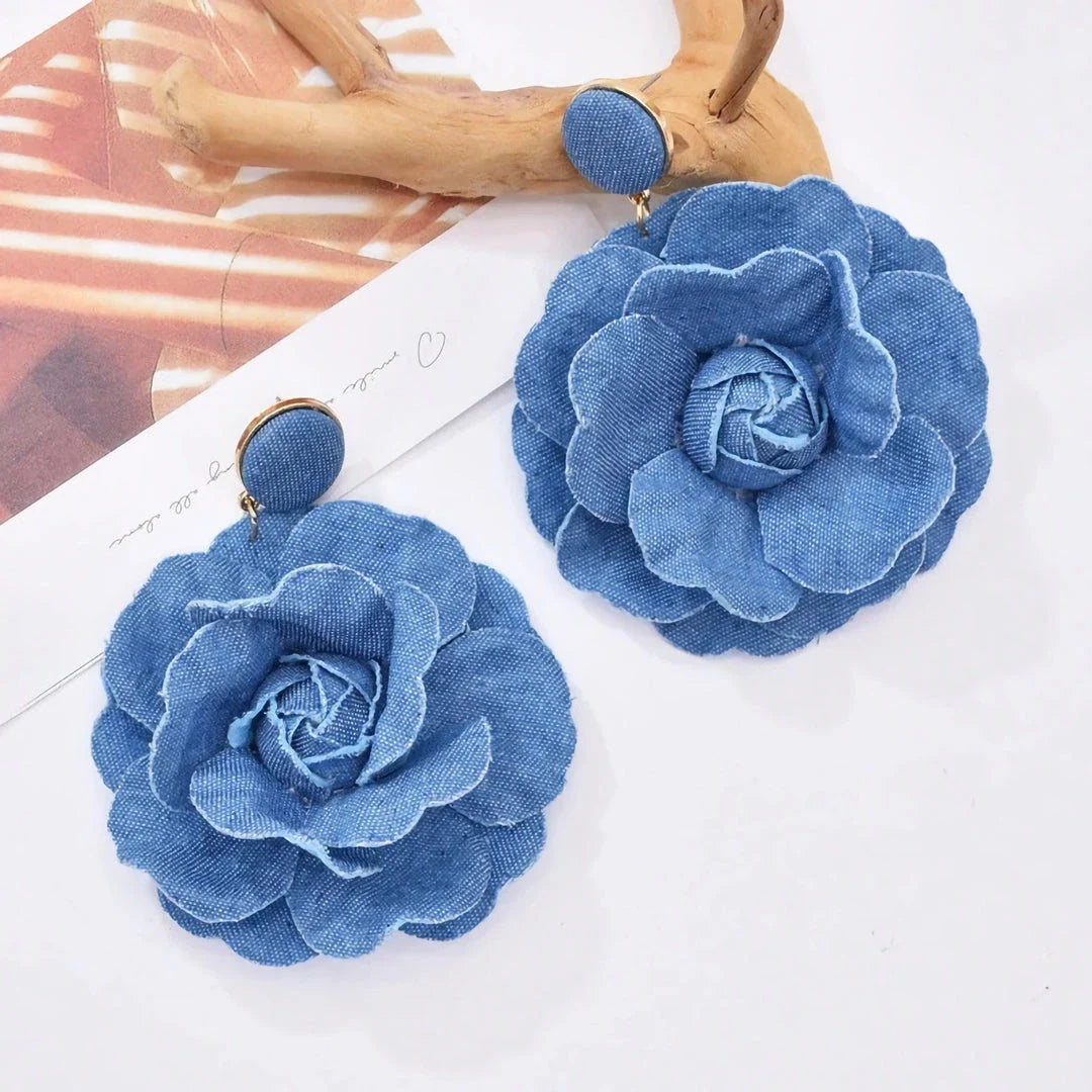 Exquisite denim drop earrings with charming accents, perfect for elevating British fashion and style