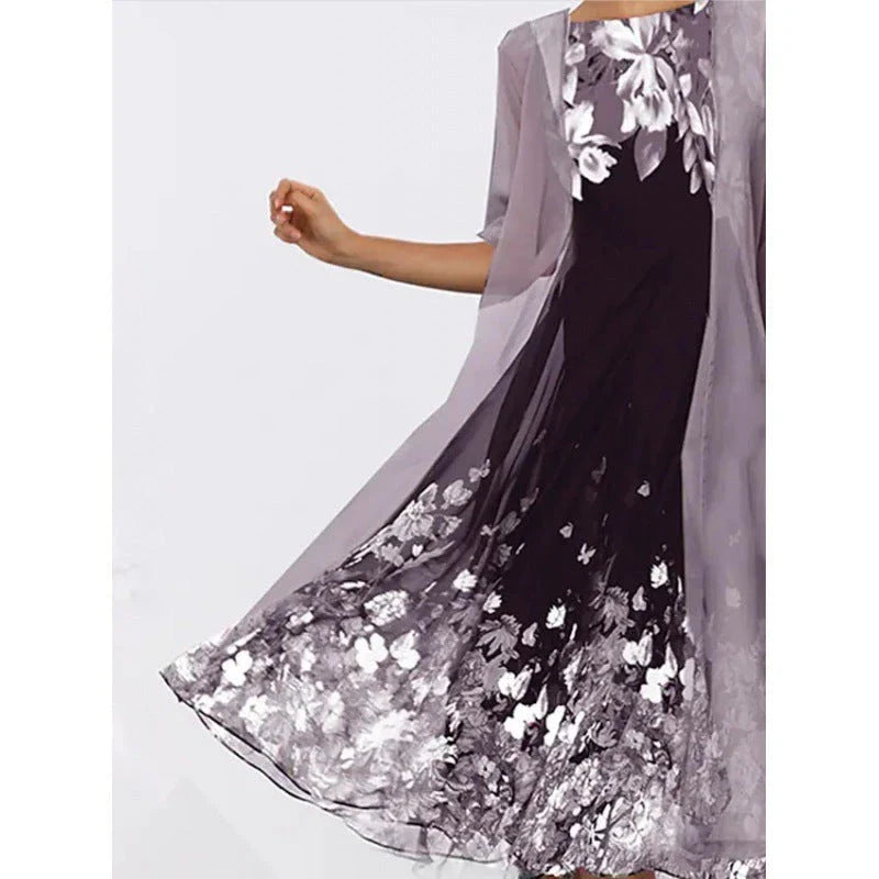 A stylish, multi-colour long dress made from high-quality chiffon fabric, featuring a comfortable swing skirt and versatile 3/4 sleeves.