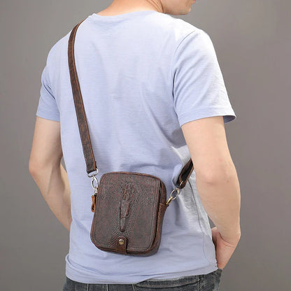 Premium cowhide leather diagonal shoulder bag for men, featuring a sophisticated box-shaped design and distinctive crocodile pattern