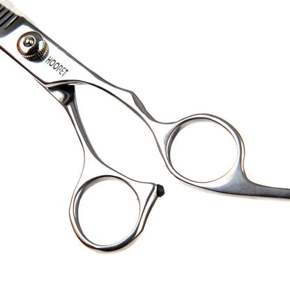 Premium stainless steel hair scissors with ergonomic handles for professional-grade grooming and hairstyling