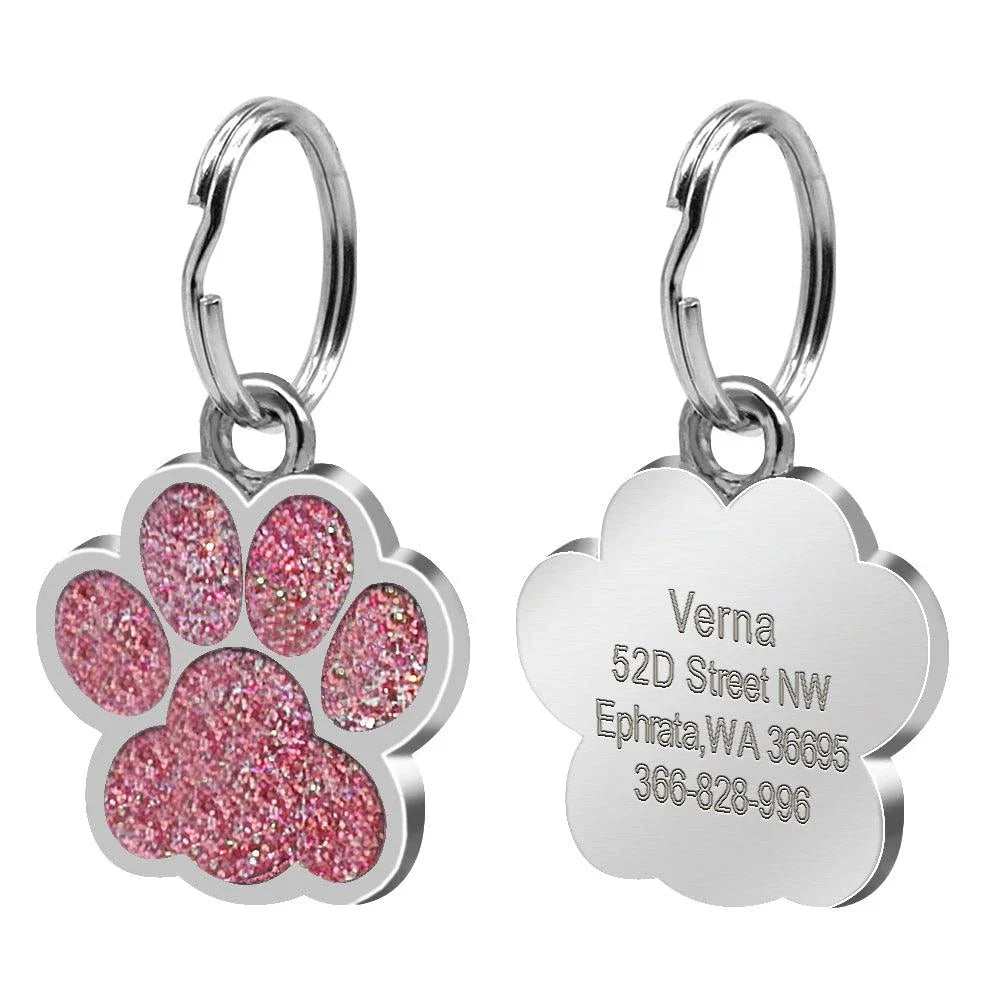 Paw-shaped pet ID tag with rhinestone embellishments, designed for safety and style